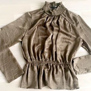 Women’s peplum satin blouse